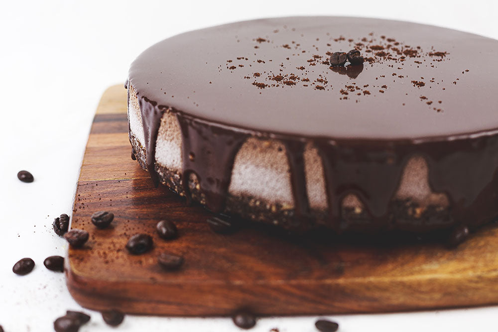 Mocha cheesecake with coffee beans all-around